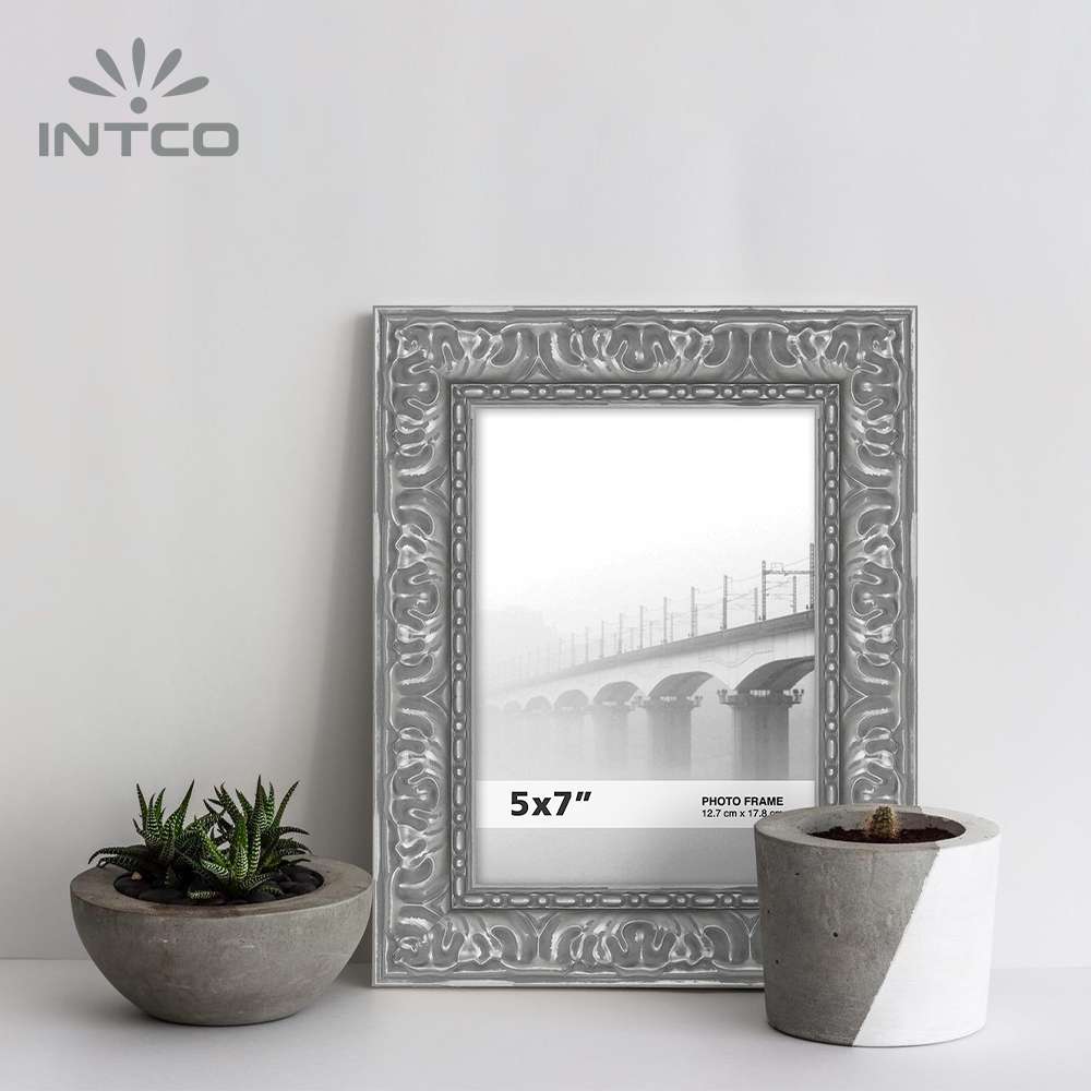 Intco silver picture frame features an embossed pattern on the silver frame to add a striking appeal to your pictures